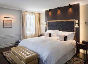 מיטה מפוארת במלון ספא וילה הונג באגם לוצרן